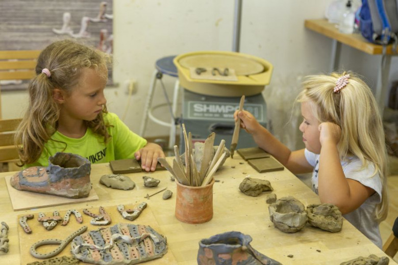  The girls make clay products