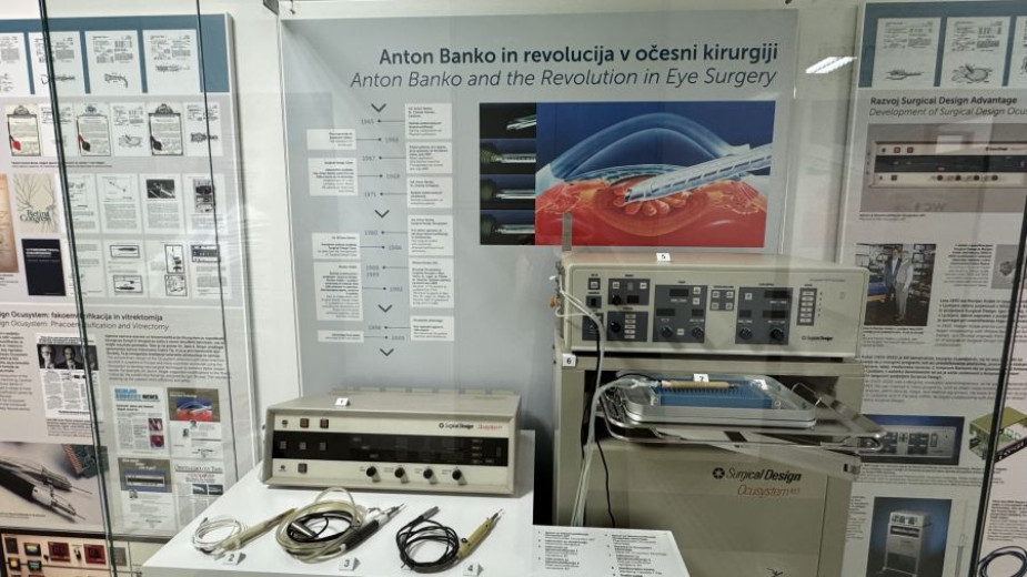 A retinal and vitreous surgery device developed by Anton Banko on display in a glass case. Information panels about Anton Banko are visible in the background.