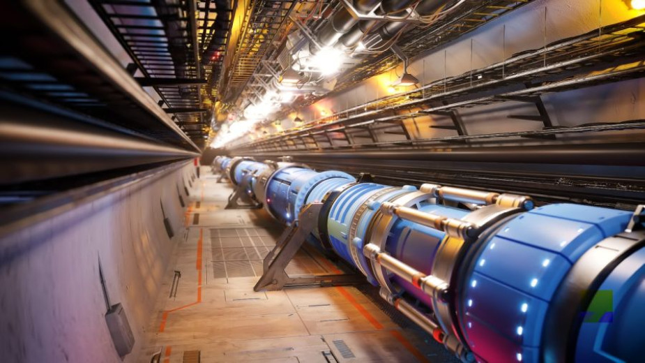 Large hadron collider: Long, lighted tunnel containing a blue and silver pipe-like structure on a metal base.