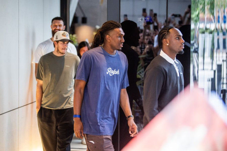 Three of Luka Dončić’s Lakers teammates leaving the hotel.