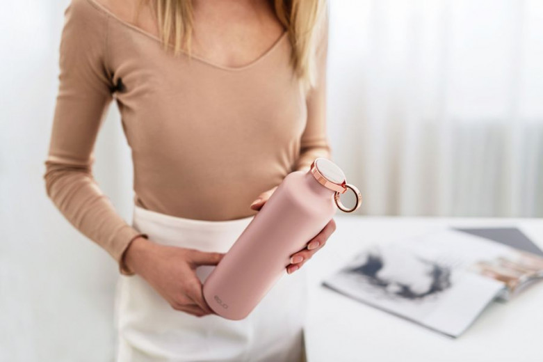 A girl with a equa smart bottle