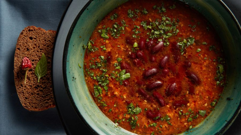 A half of the plate with the soup made from beans