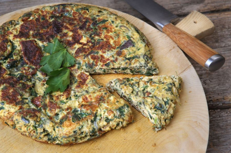 omelette with herbs on the desk