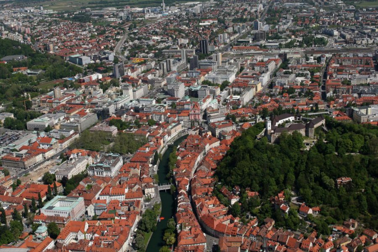 Aerial view of Ljubljana on a city centre with the river Ljubljanica and a castle Ljubljanski grad