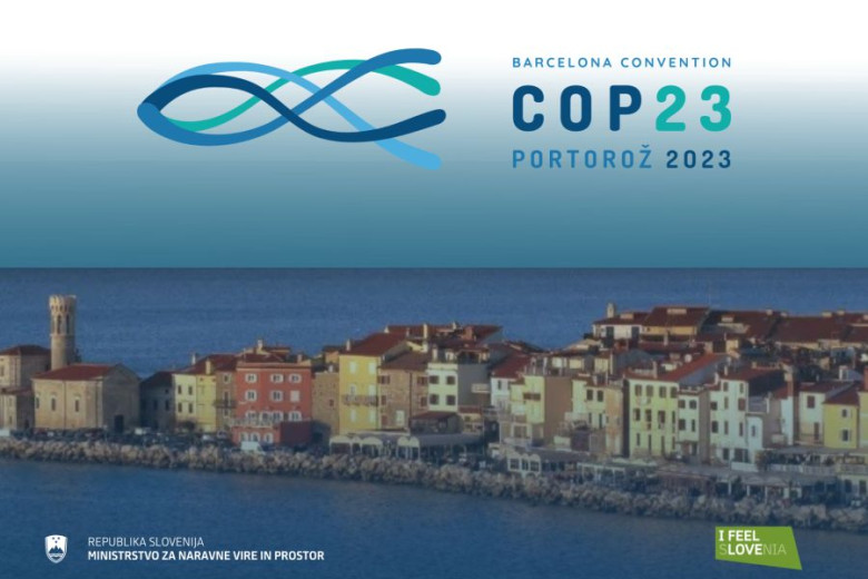 The COP 23 logo on a photo of the city of Piran.