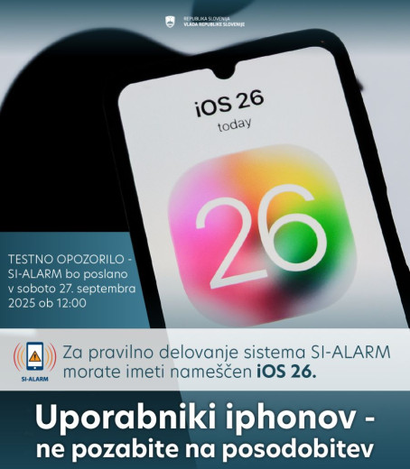 Obvestilo, ki uporabnike Apple telefonov poziva k namestitvi sistema iOS 26, potrebnega za delovanje sistema SI-ALARM. Slika prikazuje mobilni telefon z napisom iOS 26 ter besedilo, ki poziva uporabnike iPhonov k posodobitvi.