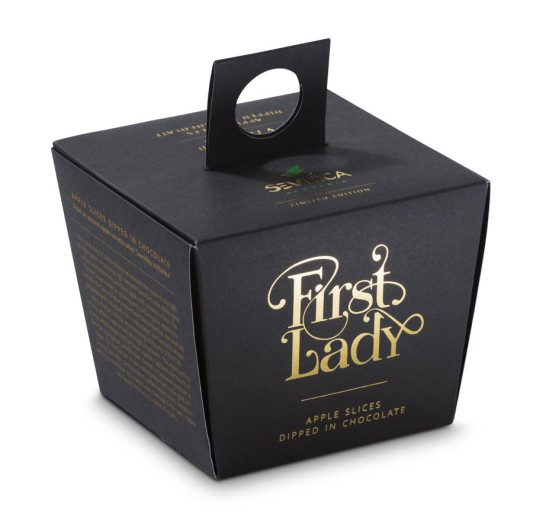 black elegant little box with the apple dried pices inside