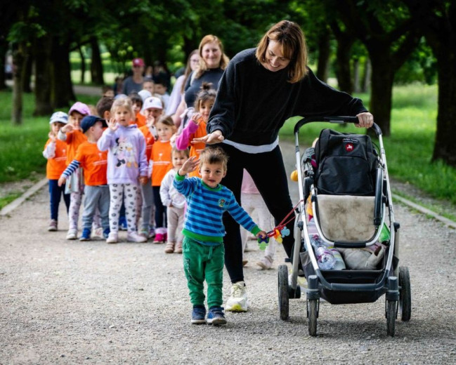 A woman is talking with the child