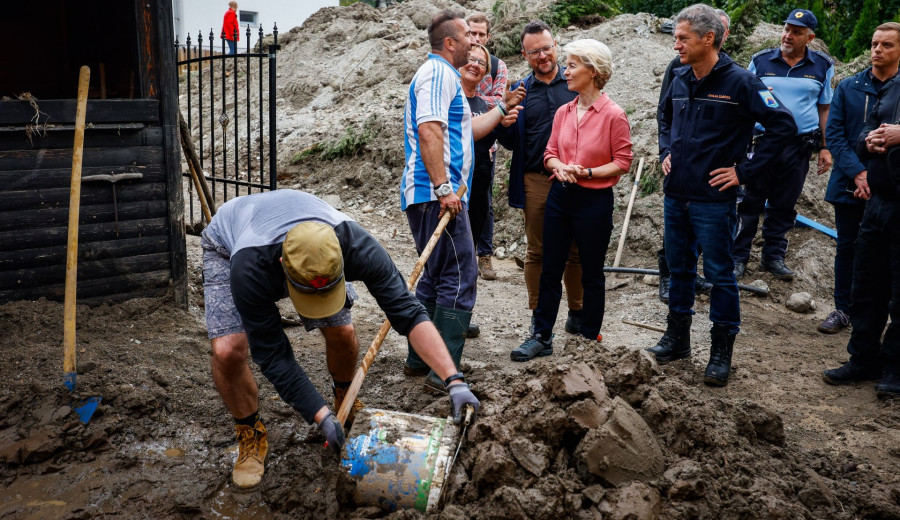 Ursula von der Leyen talking to locals.