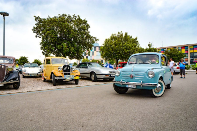 Some old cars on the parking place.
