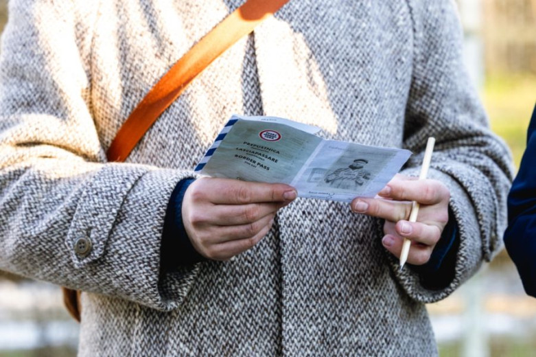 Document in the hands of a woman