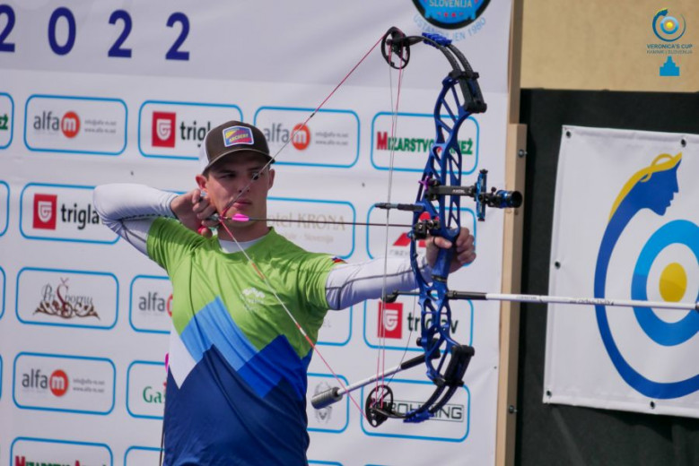 Aljaž Matija Brenk with a bow in his hands.