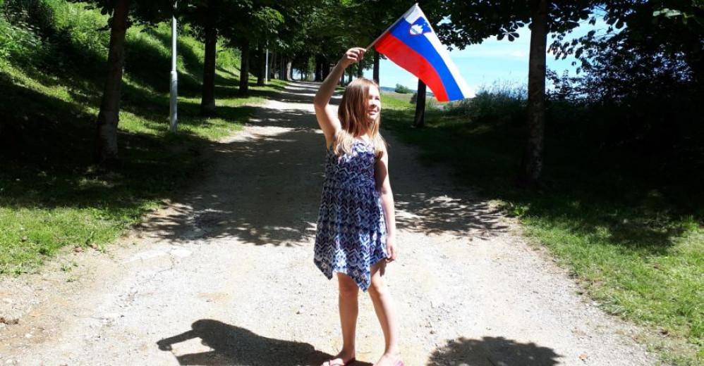 A girl with Slovenian flag