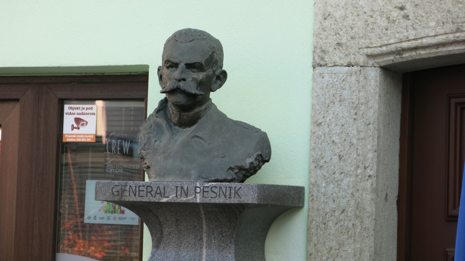 A bust of Rudolf Maister in front of his birthplace in Kamnik.