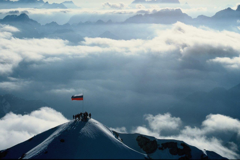 The top of Triglav with the Slovenian flag.