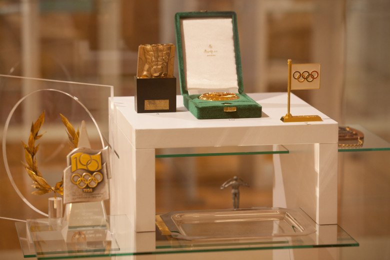 Medals from the sports games on display.