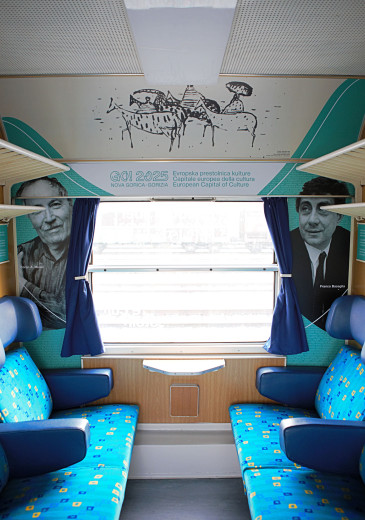 A train window, on the left a photograph of painter Zoran Mušič, on the right of Italian psychiatrist Franco Basaglia.