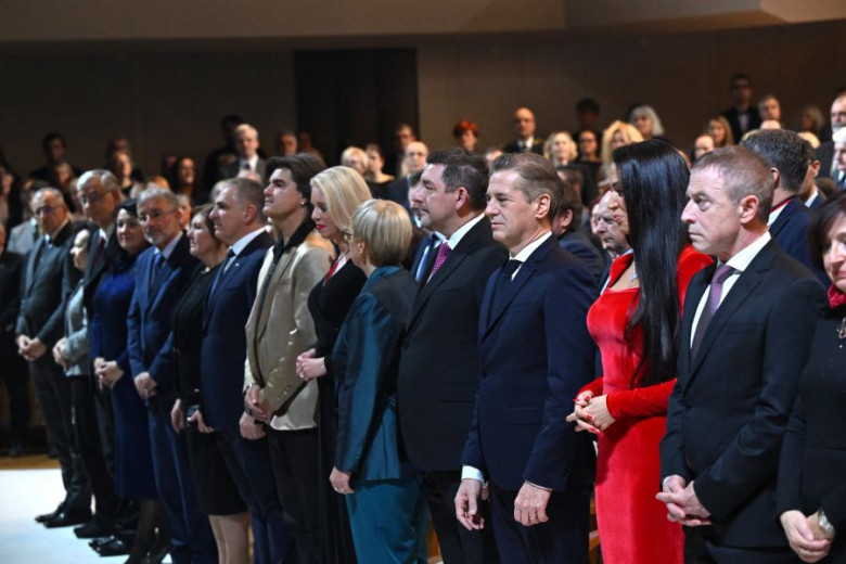 Top state officials and other high representatives of political, social life in Slovenia standing at the ceremony.
