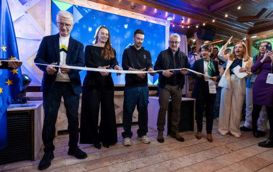 Franjo Bobinac, Tina Maze, Primož Roglič and Matjaž Han are cutting the ribbon at the opening ceremony of Slovenia House.